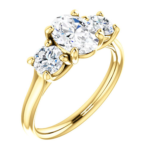 2.1 ct tw Forever One Oval Moissanite 3-Stone Ring 14k Yellow Gold