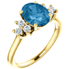 14kt Yellow Gold 2.4 ct Oval Swiss Blue Topaz and 1/4 ct Diamond Ring