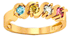 with 4 stones in yellow gold